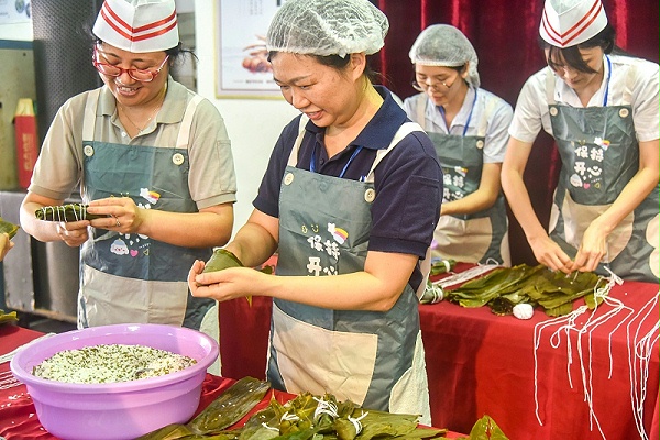 广州美亚开展“浓情端午 粽享欢乐”包粽子比赛！